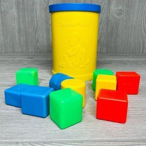 Vintage 1977 fisher price shape sorter canister and 10 blocks multi color toy